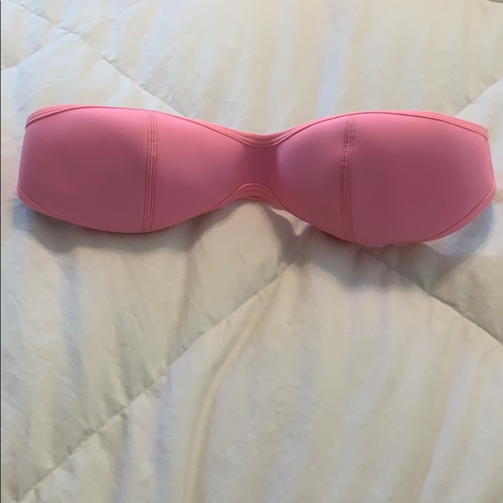 Bright pink bathing suit top